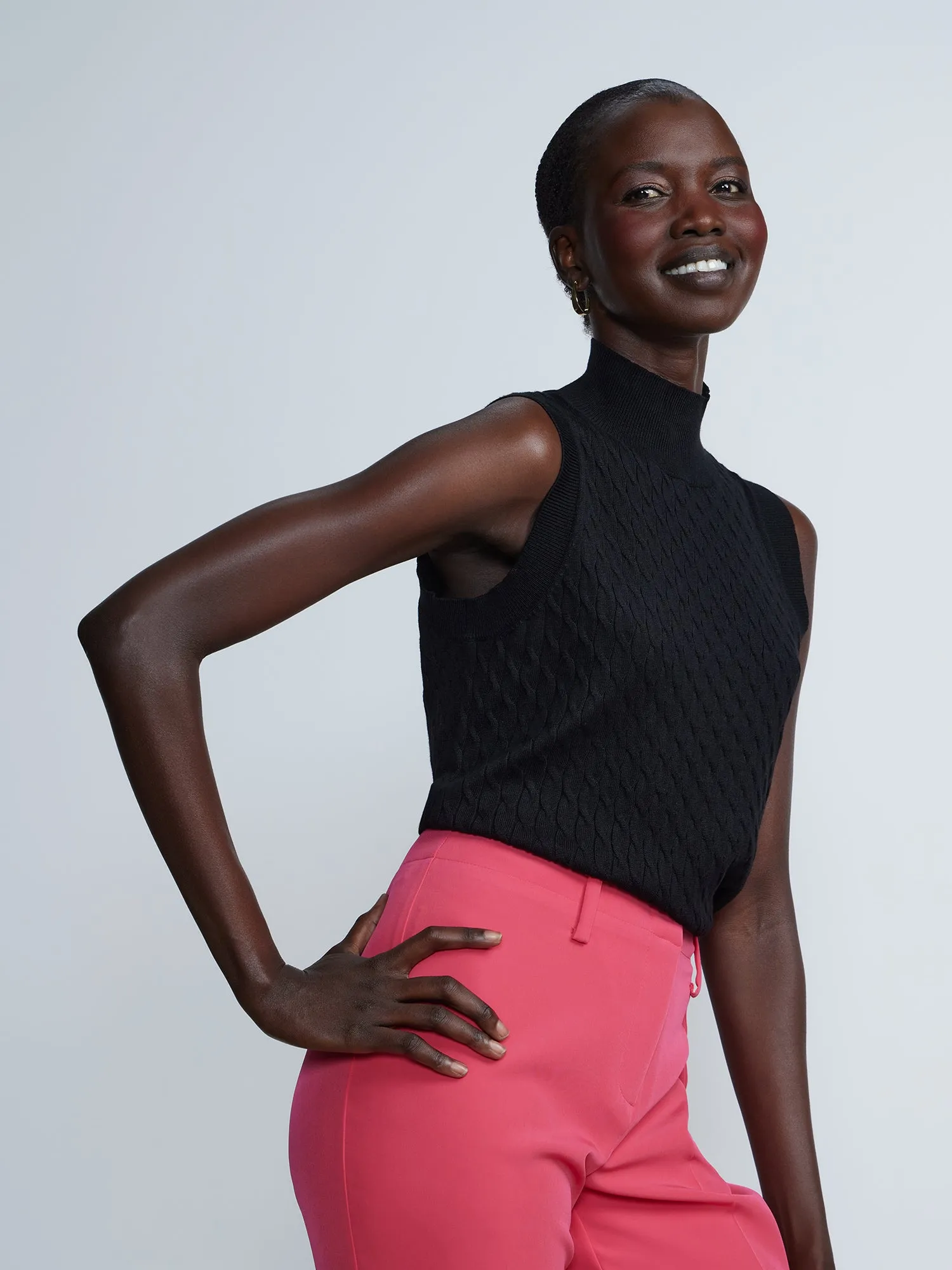 Sleeveless Cable Knit Mock Neck Sweater